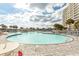 Large circular pool with plenty of lounge chairs and a gazebo at 5801 Oyster Catcher Dr. # 1624, North Myrtle Beach, SC 29582