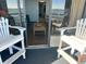 Balcony with ocean view and seating at 6804 N Ocean Blvd. # 1527, Myrtle Beach, SC 29572