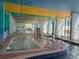 Indoor pool and hot tub with colorful decor at 6804 N Ocean Blvd. # 1527, Myrtle Beach, SC 29572
