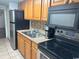 Small kitchen with stainless steel appliances at 6804 N Ocean Blvd. # 1527, Myrtle Beach, SC 29572
