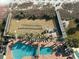 Aerial view of pool, lawn, and playground at 6804 N Ocean Blvd. # 1527, Myrtle Beach, SC 29572
