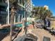 Resort-style pool with a bridge, hot tub, and lounge chairs at 6804 N Ocean Blvd. # 1527, Myrtle Beach, SC 29572