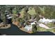 Aerial view of community with pool, clubhouse and golf course at 786 Savannah Dr., Pawleys Island, SC 29585