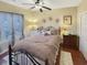 Cozy bedroom with double bed, two dressers, and window with curtains at 786 Savannah Dr., Pawleys Island, SC 29585