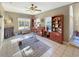 Bright bonus room with built-in shelving and exercise equipment at 786 Savannah Dr., Pawleys Island, SC 29585