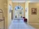 Elegant entryway with a chandelier and double doors at 786 Savannah Dr., Pawleys Island, SC 29585