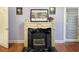 Ornate fireplace in main bedroom with black screen at 786 Savannah Dr., Pawleys Island, SC 29585