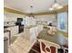 Eat-in kitchen with granite counters, island, and white cabinets at 786 Savannah Dr., Pawleys Island, SC 29585