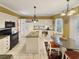 Eat-in kitchen with granite counters, island, and white cabinets at 786 Savannah Dr., Pawleys Island, SC 29585