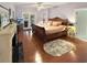 Main bedroom with fireplace, large bed, and access to deck at 786 Savannah Dr., Pawleys Island, SC 29585