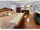 Main bedroom with plush bedding and hardwood floors at 786 Savannah Dr., Pawleys Island, SC 29585