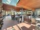 Large screened porch with patio furniture and grilling station at 786 Savannah Dr., Pawleys Island, SC 29585
