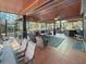 Screened porch with hot tub and comfortable seating at 786 Savannah Dr., Pawleys Island, SC 29585