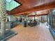 Spacious screened-in porch with hot tub and patio furniture at 786 Savannah Dr., Pawleys Island, SC 29585