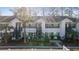 Exterior of a two-story condo building with green shutters and staircases at 820 Fairway Dr. # 1605, Longs, SC 29568