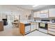 Wide view of the kitchen and living room at 820 Fairway Dr. # 1605, Longs, SC 29568