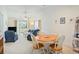 Spacious living room features a ceiling fan and sliding glass doors to the patio at 820 Fairway Dr. # 1605, Longs, SC 29568