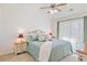 Main bedroom features a ceiling fan and bright windows at 820 Fairway Dr. # 1605, Longs, SC 29568