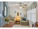 Charming sitting area with cozy seating, a side table, and a window with natural light at 820 Fairway Dr. # 1605, Longs, SC 29568