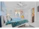 Guest bedroom with ceiling fan and twin beds at 9503 Queens Ct., Myrtle Beach, SC 29572