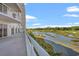 Enjoy the serene view of the golf course and marsh from the private balcony at 9547 Edgerton Dr. # 904, Myrtle Beach, SC 29572