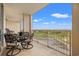 Beautiful balcony provides ample seating and overlooks a scenic waterfront landscape at 9547 Edgerton Dr. # 904, Myrtle Beach, SC 29572