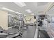 Well-equipped exercise room features treadmills, weight machines, and mirrored walls for a comprehensive workout at 9547 Edgerton Dr. # 904, Myrtle Beach, SC 29572