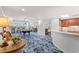 Spacious game room features a pool table, ample seating, and a stylish bar area with rich wood cabinetry at 9547 Edgerton Dr. # 904, Myrtle Beach, SC 29572