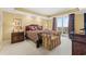 Luxurious main bedroom featuring balcony access, a decorative bed, and side tables at 9547 Edgerton Dr. # 904, Myrtle Beach, SC 29572