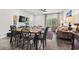 Dining area with wooden table and chairs near living room and kitchen at 97 Sea Shell Dr. # 33, Murrells Inlet, SC 29576