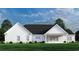 Rear view of the home showcasing a covered patio at 2176 Pettus Way, Surfside Beach, SC 29575