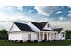 Side view of a white farmhouse with black roof and landscaping at 2184 Pettus Way, Surfside Beach, SC 29575