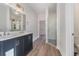 Modern bathroom featuring double sinks, granite countertop, and a glass enclosed shower at 1033 Pisgah Church Rd., Aynor, SC 29511