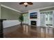 Bright living room features a fireplace and built-in entertainment center at 1204 Wading Heron Rd., North Myrtle Beach, SC 29582