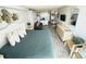 King size bed in main bedroom with full view of kitchenette at 1207 S Ocean Blvd. # 20207, Myrtle Beach, SC 29577