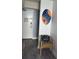 Bright entryway with a comfy chair and coastal decor at 1207 S Ocean Blvd. # 20207, Myrtle Beach, SC 29577