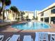 Inviting community pool with lounge chairs at 1207 S Ocean Blvd. # 20207, Myrtle Beach, SC 29577