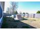Backyard with wooden deck, above ground pool, and fence at 130 Lions Paw Ct., Loris, SC 29569