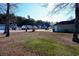 Empty lot with trees and neighboring houses visible at 130 Lions Paw Ct., Loris, SC 29569