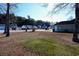 Residential street view with houses and landscaping at 130 Lions Paw Ct., Loris, SC 29569