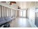 Sunroom with tiled floor and comfy seating at 130 Lions Paw Ct., Loris, SC 29569