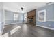 Living room with fireplace and light blue walls at 134 Manor Circle, Myrtle Beach, SC 29588