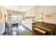 Bright breakfast nook with built-in shelving and piano at 150 Black Water Dr., Murrells Inlet, SC 29576