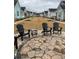 Community area with seating and a stone firepit at 150 Black Water Dr., Murrells Inlet, SC 29576