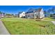 Houses with front porches and green lawns at 150 Black Water Dr., Murrells Inlet, SC 29576