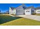 Two-car garage and side yard at 150 Black Water Dr., Murrells Inlet, SC 29576