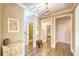 Elegant hallway with hardwood floors and decor at 150 Black Water Dr., Murrells Inlet, SC 29576