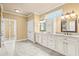 Spacious bathroom with dual vanities, granite countertops, and ample storage space at 2000 Hideaway Point, Myrtle Beach, SC 29579