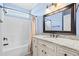 Bathroom features granite countertop, white cabinets, shower and tub at 2000 Hideaway Point, Myrtle Beach, SC 29579