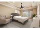 Serene bedroom featuring a tray ceiling, neutral tones, and a comfortable king-size bed at 2000 Hideaway Point, Myrtle Beach, SC 29579